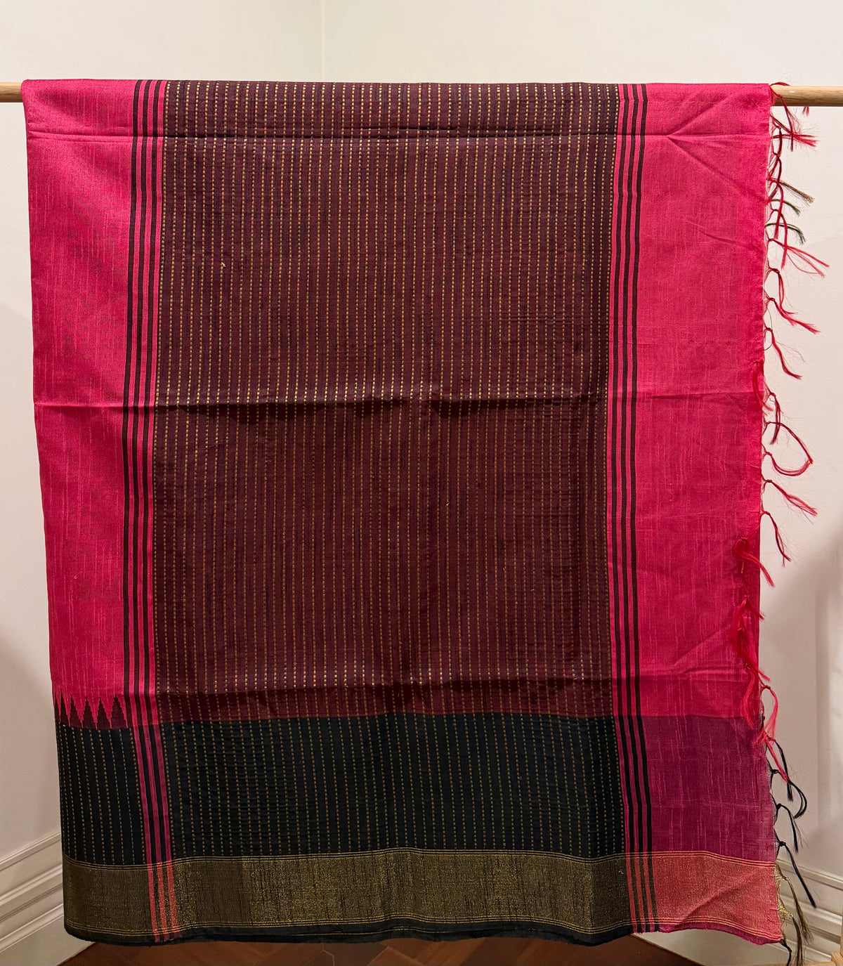 Pink plain dupion saree, contrast zari striped temple border, and zari striped pallu